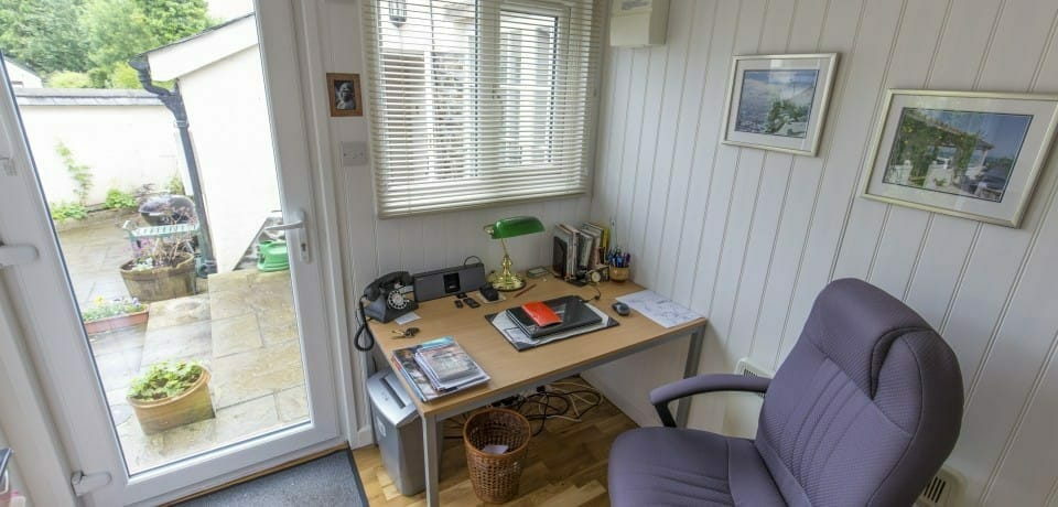 Luxury garden office with wood floors