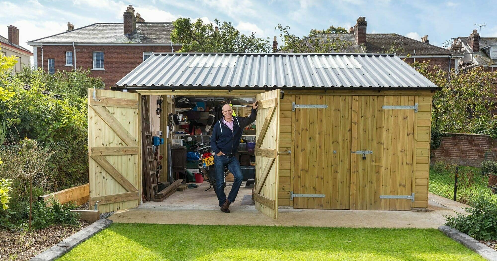 Large wooden garage with concrete base