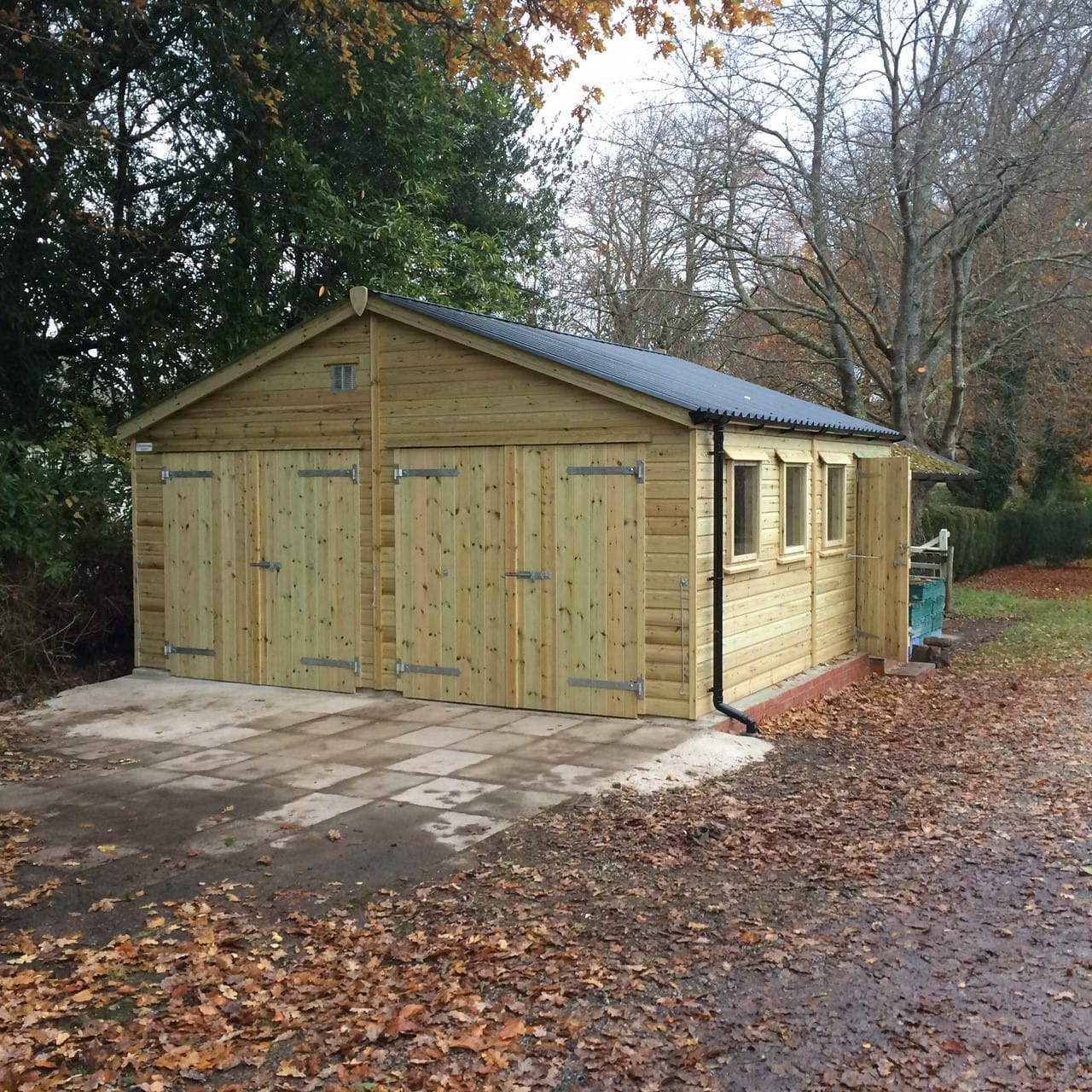 Double timber garage with windows